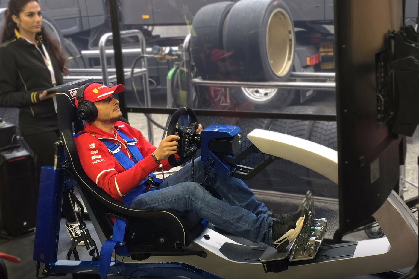 An early ImSim installation beside a race car, in a racing garage.