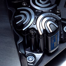 A tactile transducer bolted under the chassis of an ImSim simulator.